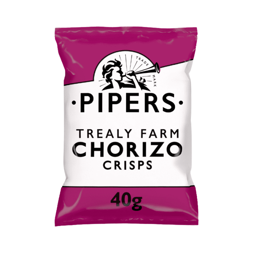 A close-up of crisps with sliced chorizo in the background.
