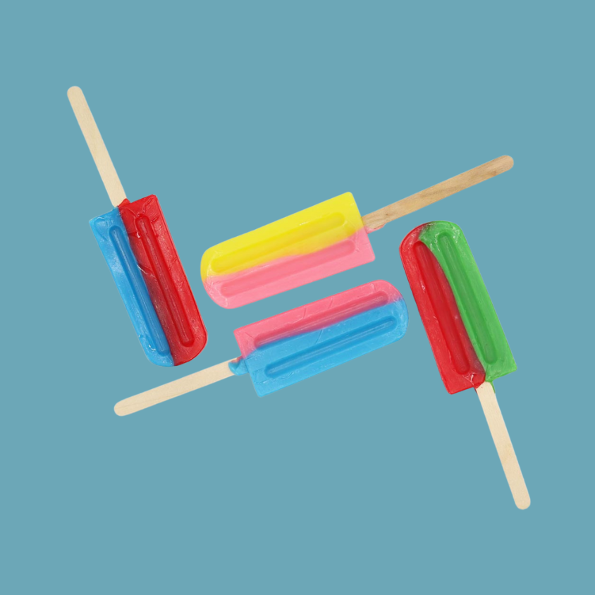 A close-up of unwrapped lollipops showing their vibrant colors and swirls.