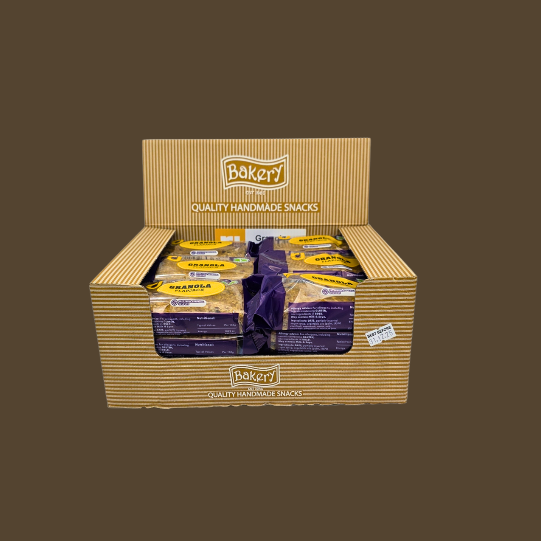 Individually wrapped flapjack bars spilling out of a picnic basket