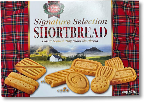 Assorted Scottish shortbread fingers, rounds, and cookies arranged on a plate
