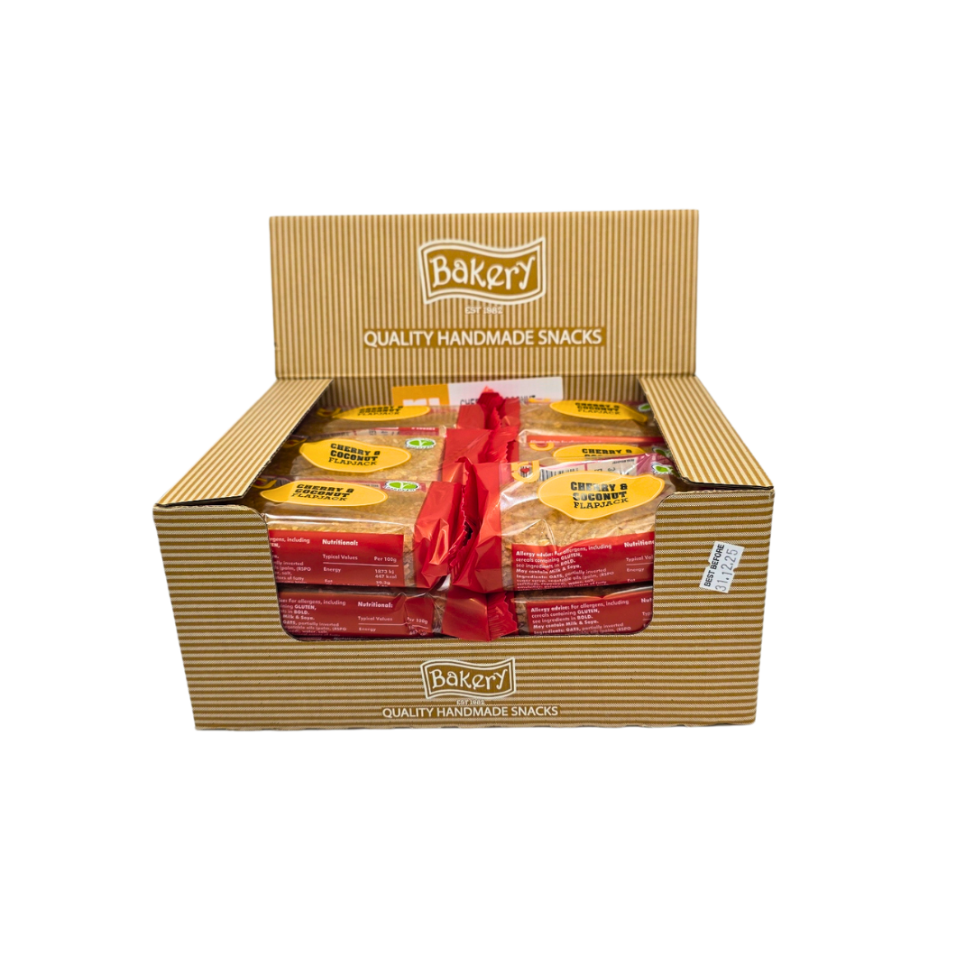 Unwrapped RJ Cherry & Coconut Flapjack Bar showing cherry pieces and coconut flakes