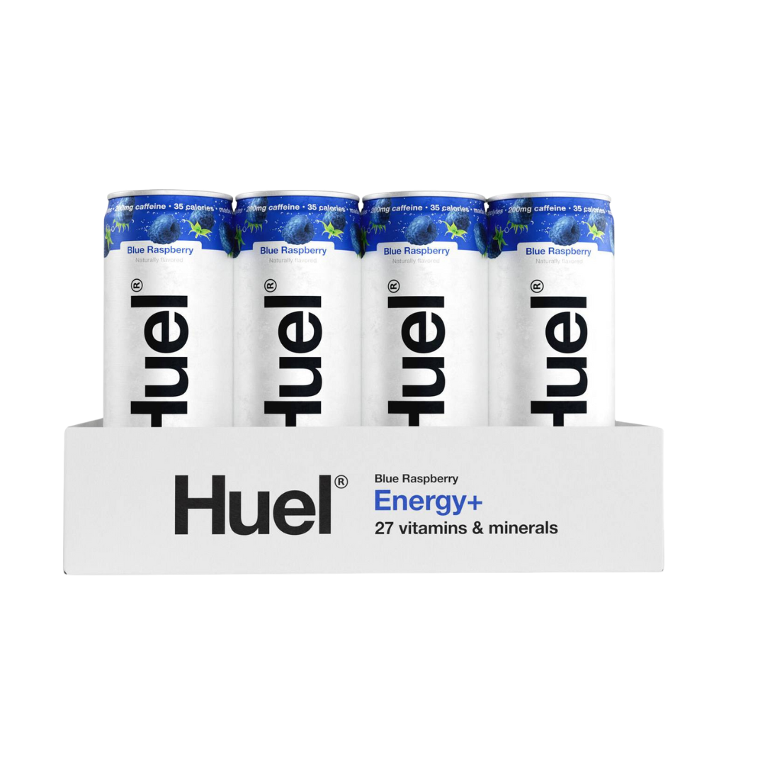 Chilled Huel can beside fresh blue raspberries on a table