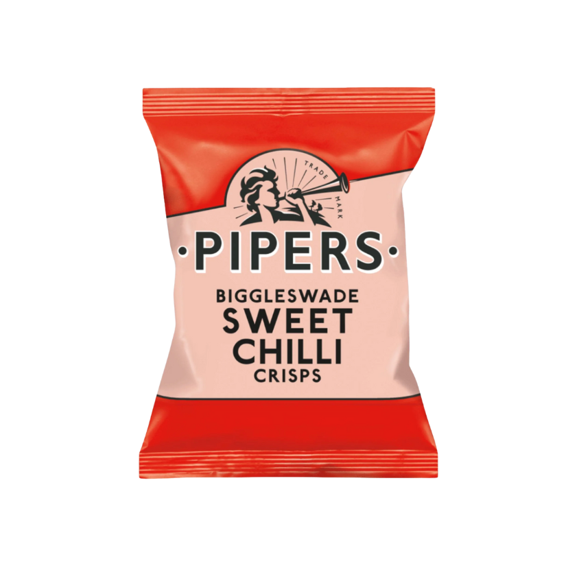 A close-up of crisps with fresh chillies in the background.
