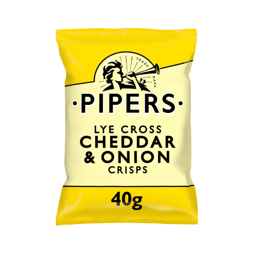 A close-up of crisps with a wedge of mature Cheddar and onions in the background.