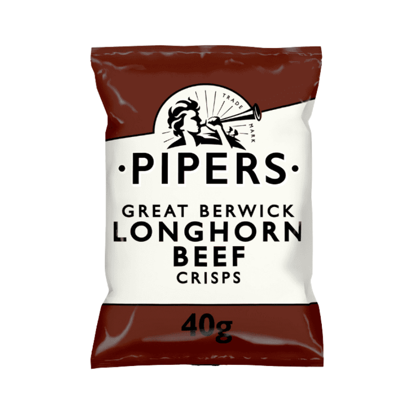 A close-up of crisps with a piece of dry-aged beef in the background.