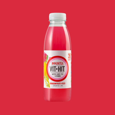 Close-up of a chilled Vit Hit Immunitea bottle, highlighting its immune-boosting ingredients.