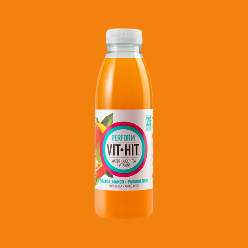 Close-up of a chilled Vit Hit Perform bottle with amino acid and matcha tea highlights.