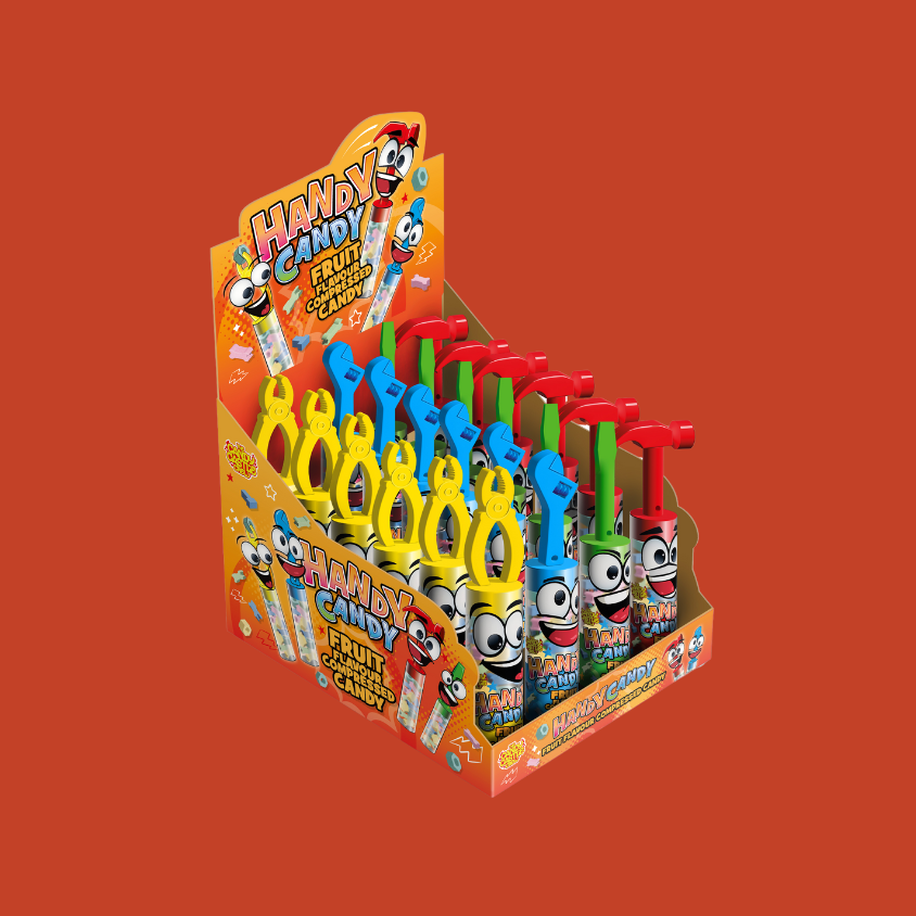 Tool-shaped fruit-flavored candy scattered on a bright surface for a playful candy display.