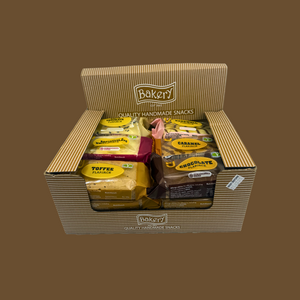 Individually wrapped cereal snack bars multipack stacked on a kitchen counter