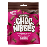Single 135g Chocolate Nibbles Original pack beside scattered bite-sized chocolate nibbles, close-up of the front label and the chocolate pieces
