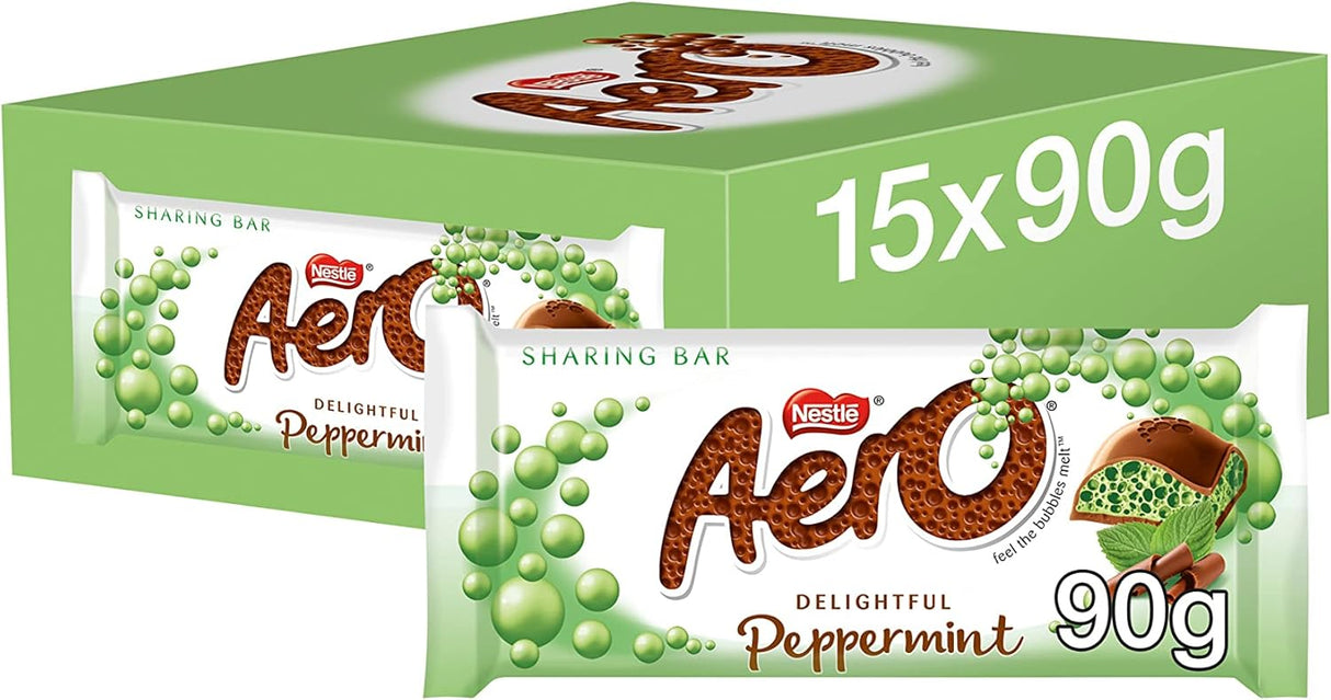 A close-up of Aero Peppermint Chocolate Bar broken in half, showing the bubbly mint filling.