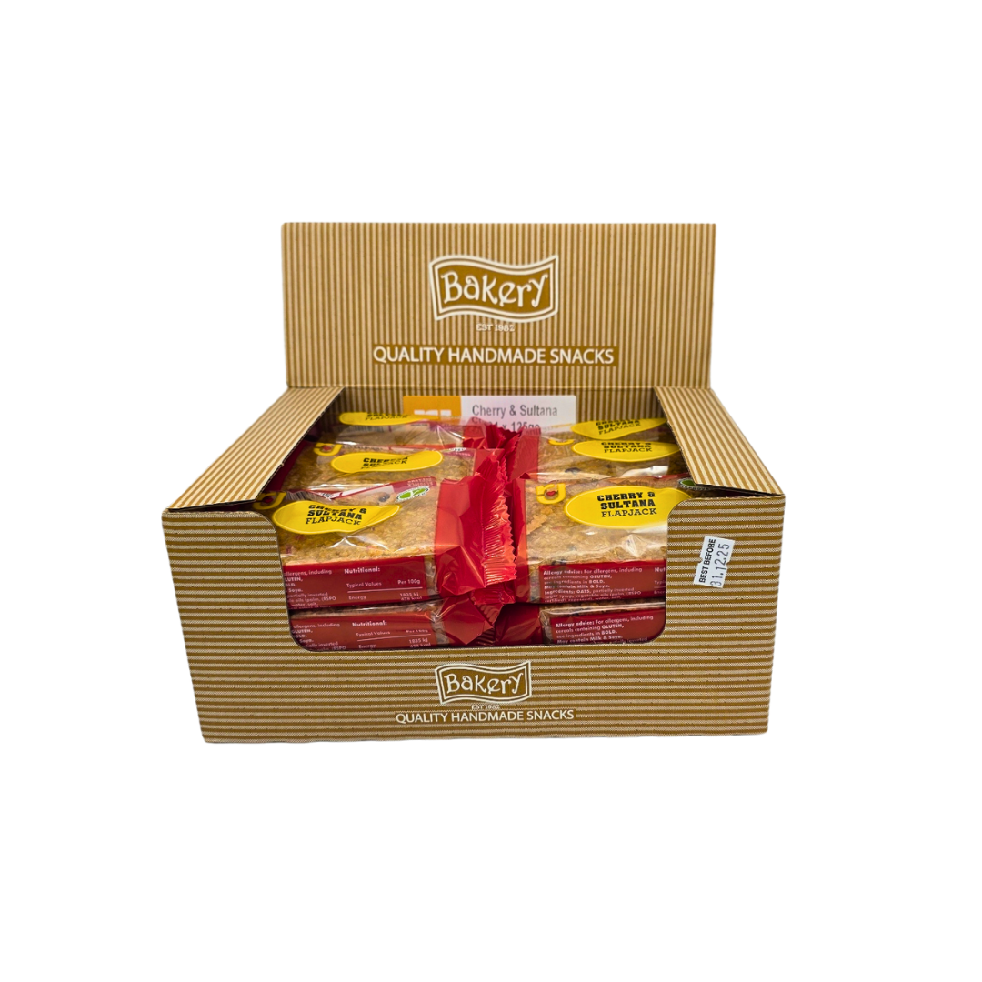 Unwrapped RJ Cherry & Sultana Flapjack Bar showing cherries and sultanas in oat base
