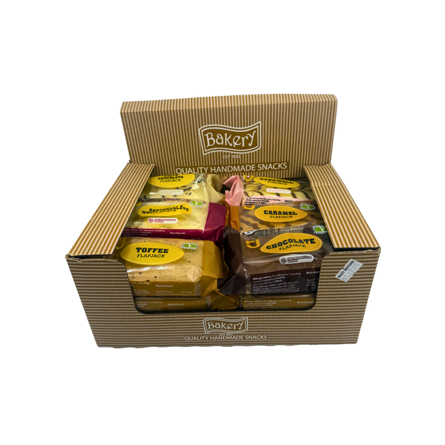 Six RJ Cereal Bars flavours arranged in a row: white chocolate, raspberry, caramel, toffee, chocolate, bakewell