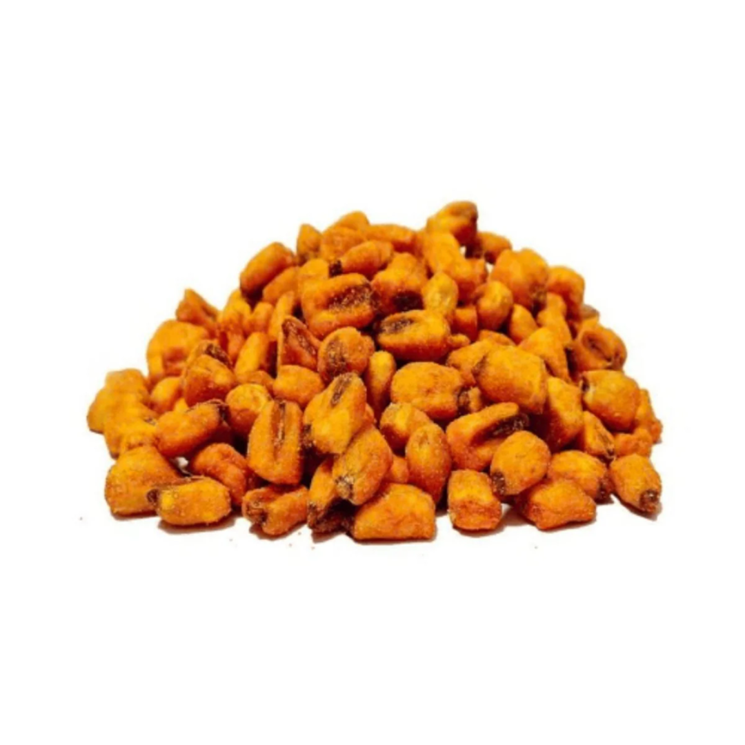 Bowl of Ginco toasted corn next to fresh lemon slices and chilli peppers

