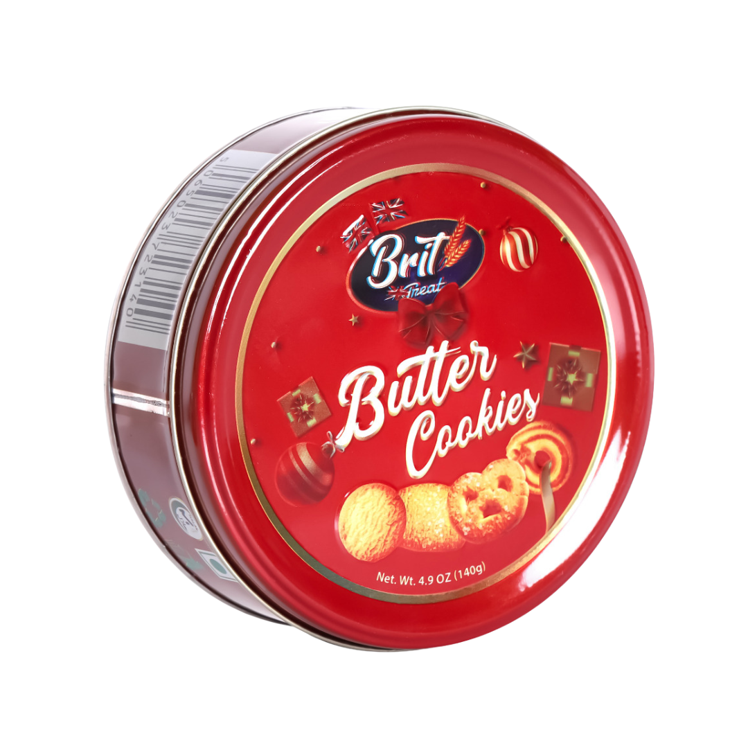 Assorted Danish butter cookies arranged on a plate beside Christmas decorations