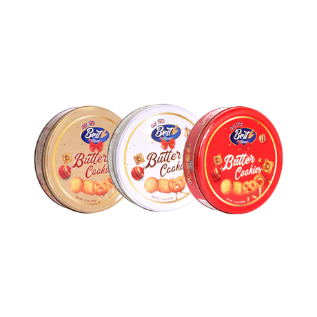 Assorted golden butter cookies displayed beside Christmas decorations