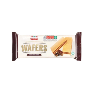 Stack of creamy chocolate wafers on a plate