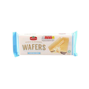 Close-up of golden wafer with creamy vanilla filling