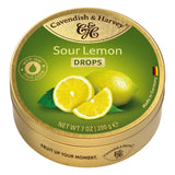 Close-up of Cavendish & Harvey 200g Sour Lemon hard candy drops with glossy yellow lemon sweets and product packaging