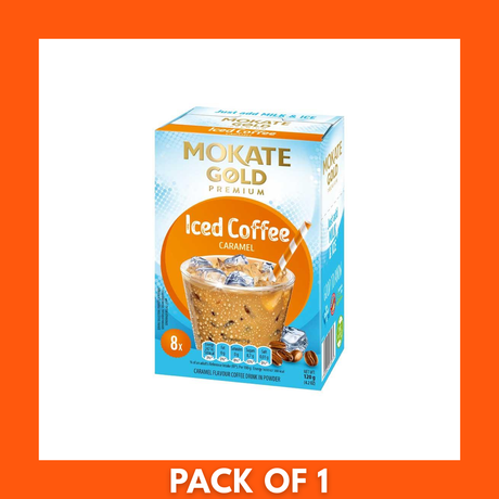Mokate Gold Premium Caramel Iced Coffee packaging beside a chilled glass of caramel-colored iced coffee with ice cubes, creamy swirl and condensation on the glass, label clearly visible