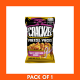 Close-up of Crackzel Honey Mustard and Onion Pretzels (85g) showing seasoned twist pretzels beside the product bag.