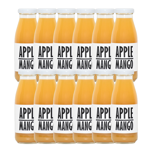 A bottle of Pressuice Apple-Mango Juice with fresh apples and mangoes beside it.