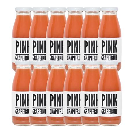 A bottle of Pressuice Pink Grapefruit Juice with fresh grapefruits in the background.