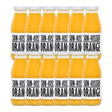 A bottle of Pressuice Sun-Kissed Orange Juice with fresh oranges in the background.