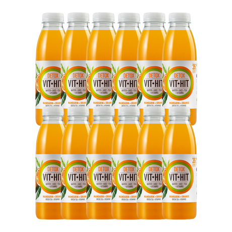 Vit Hit Detox Mandarin & Orange Vitamin Drink 12-pack display with fresh citrus fruits.