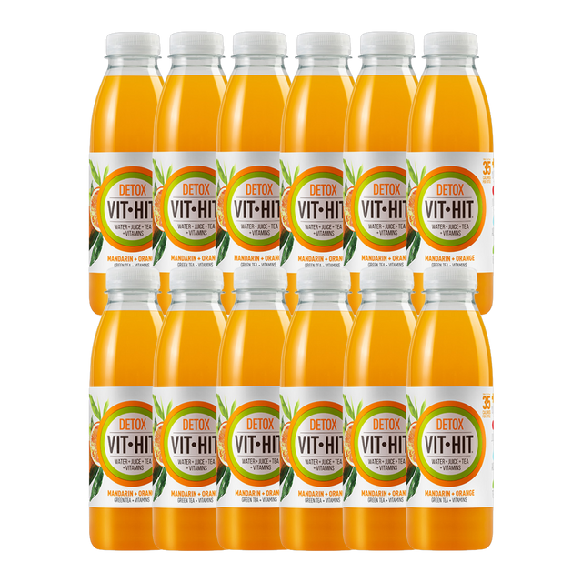 Vit Hit Detox Mandarin & Orange Vitamin Drink 12-pack display with fresh citrus fruits.